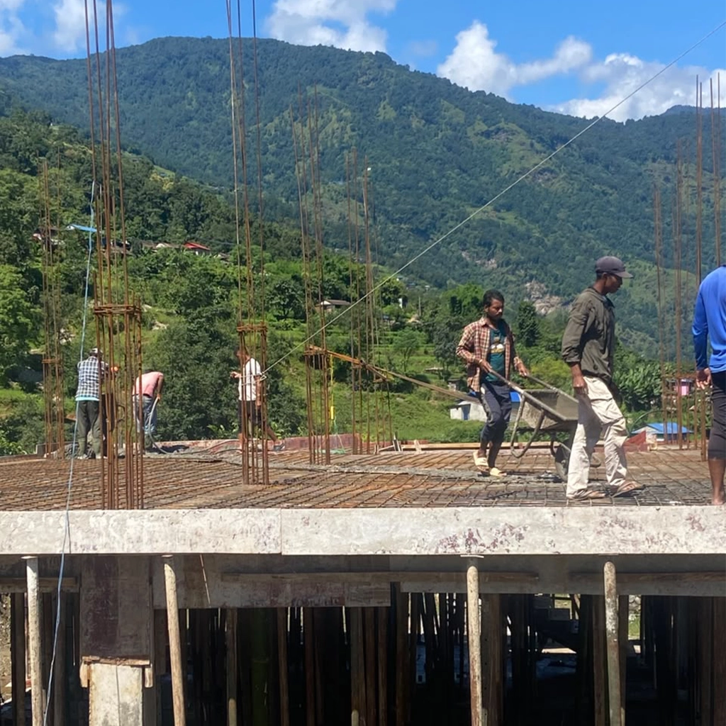 Workers in the construction site of Simpani Health Post